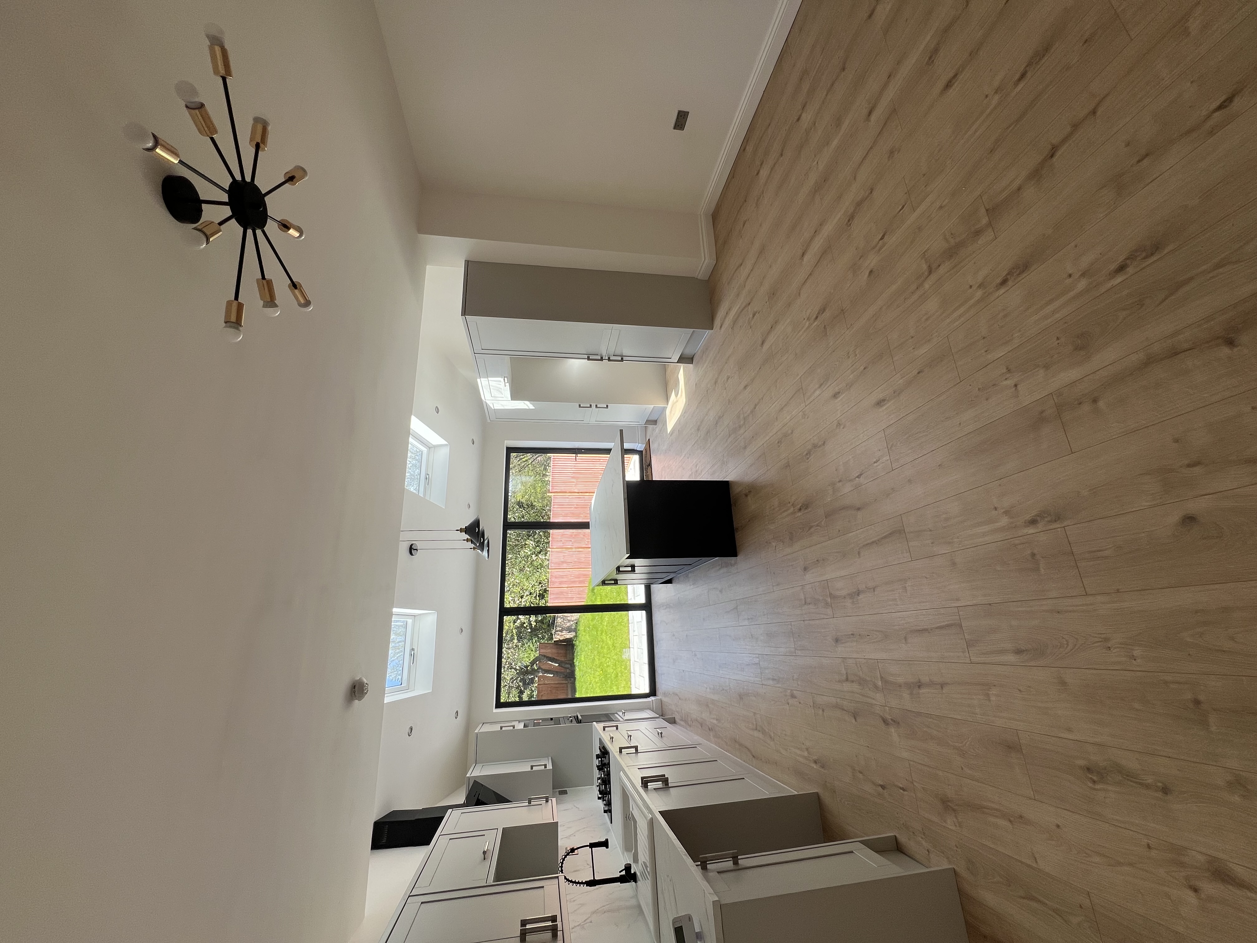 Open-plan kitchen and living space in a completed West Stone Homes development